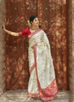 Ivory Silk Saree with Antique Red Zari Border & Royal Motif Weaving – Elegant Wedding & Festive Wear - Image 9