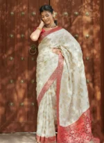 Ivory Silk Saree with Antique Red Zari Border & Royal Motif Weaving – Elegant Wedding & Festive Wear - Image 2